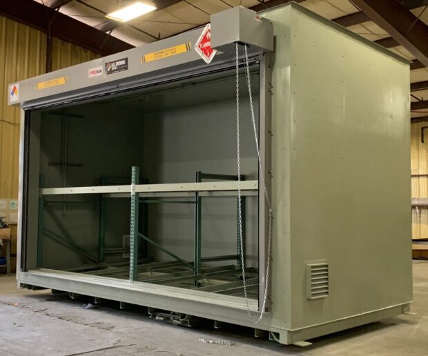 IronVaultDistillery_Pushbackracks_FireLoc2 Angled photo of a two-level US Chemical Storage ethanol storage building for a distillery showing the ventilation and manual roll up door