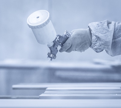 Person spray painting whitepaper